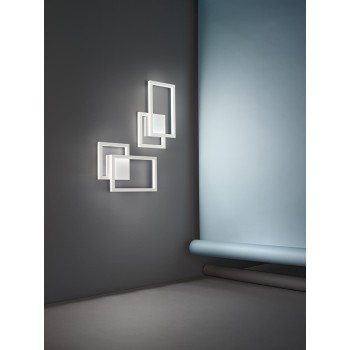 Cross white 6598 Perenz led wall light. structure composed of 2 crossed panels in metal and aluminum, 20W.